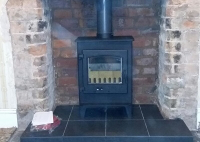 Deans Forge Croft Junior outset multi fuel stove with a 316 grade chimney liner & A Solid Tiled Hearth Stourbridge, West Midlands